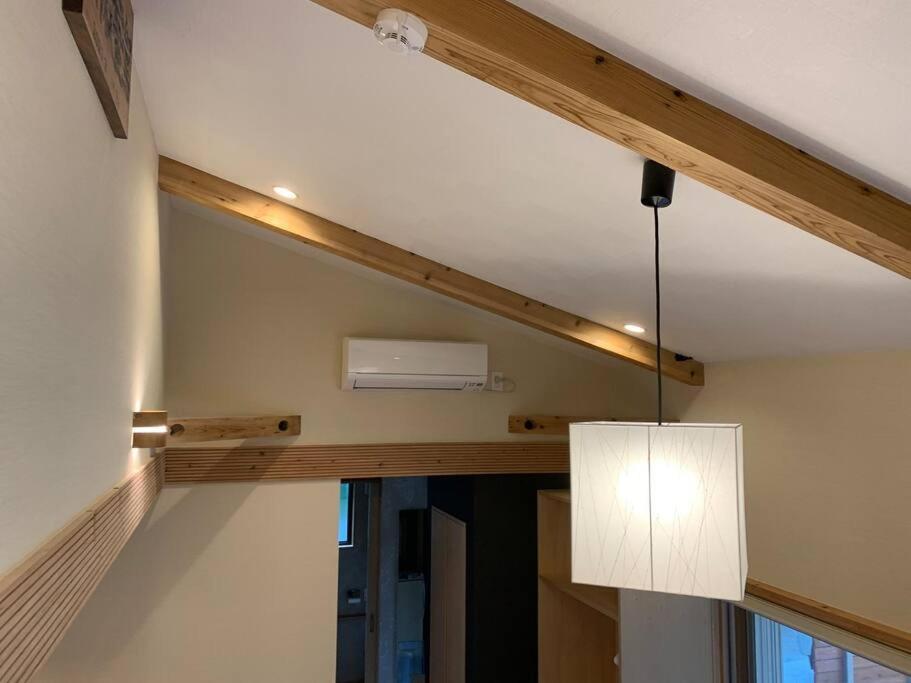 Villa マムヴィッラin森の中の一軒家 à Nago Extérieur photo
