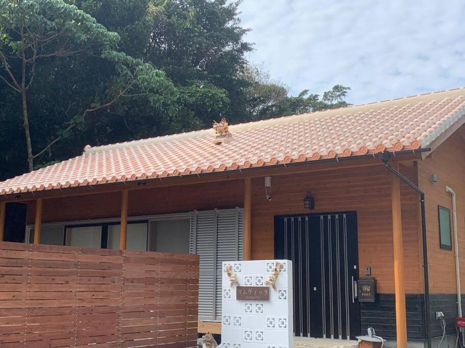 Villa マムヴィッラin森の中の一軒家 à Nago Extérieur photo