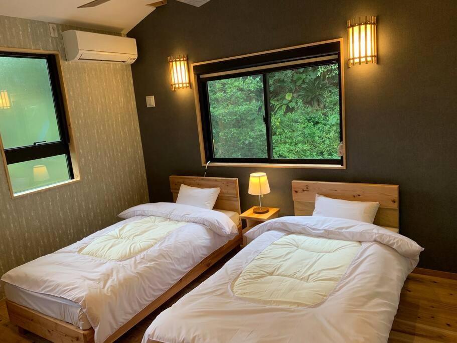 Villa マムヴィッラin森の中の一軒家 à Nago Extérieur photo