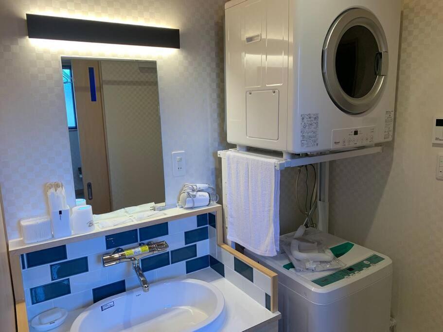 Villa マムヴィッラin森の中の一軒家 à Nago Extérieur photo