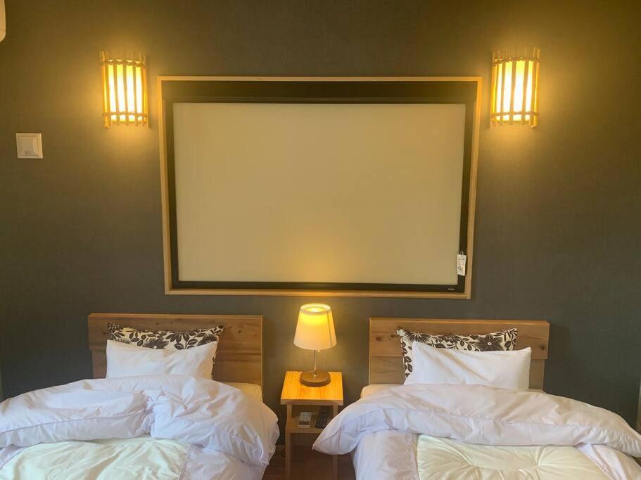 Villa マムヴィッラin森の中の一軒家 à Nago Extérieur photo