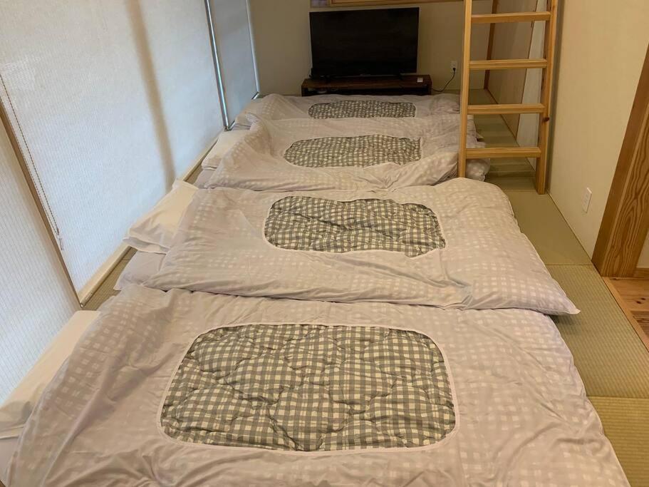 Villa マムヴィッラin森の中の一軒家 à Nago Extérieur photo