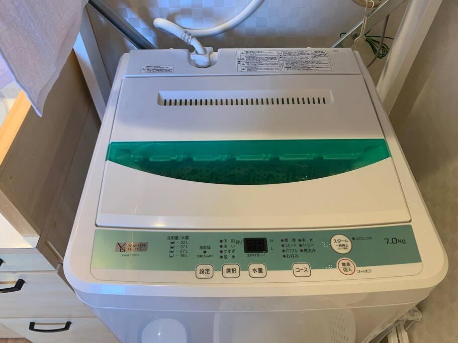 Villa マムヴィッラin森の中の一軒家 à Nago Extérieur photo